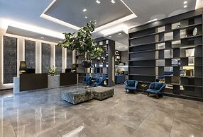 York Medellin, Curio Collection by Hilton