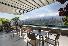 York Medellin, Curio Collection by Hilton