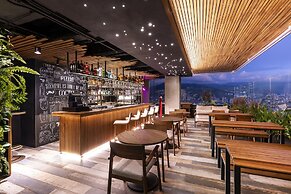 York Medellin, Curio Collection by Hilton