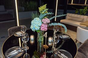 York Medellin, Curio Collection by Hilton