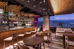 York Medellin, Curio Collection by Hilton