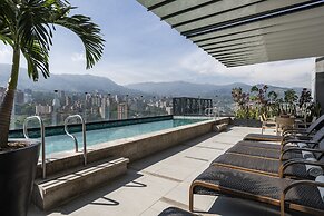 York Medellin, Curio Collection by Hilton