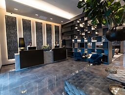 York Medellin, Curio Collection by Hilton