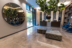 York Medellin, Curio Collection by Hilton