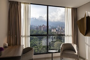 York Medellin, Curio Collection by Hilton