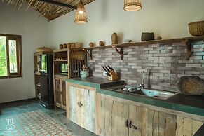 Maison Que