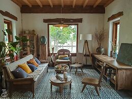 Maison Que