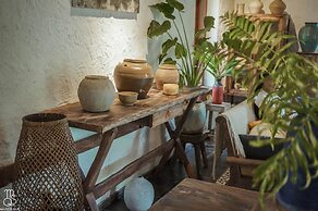 Maison Que