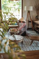 Maison Que