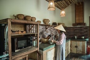 Maison Que