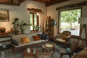 Maison Que