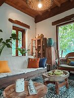 Maison Que