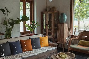 Maison Que