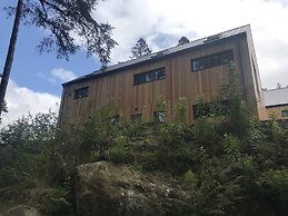 An Caisteal Lodge With Cascading Waterfall View