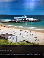 Immaculate 4-bed Apartment in Bournemouth & spa