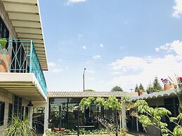 Cálido Cosmos Hotel