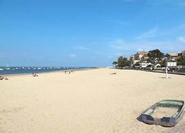 Poolside Escape by Arcachon