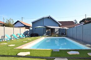 Poolside Escape by Arcachon