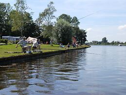 Chalet in Bergumermeer by the Canal