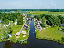 Chalet in Bergumermeer by the Canal