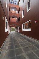 Meson Real Hotel & Suites