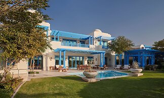 Hilton Salwa Beach Resort & Villas