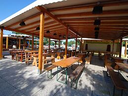 Wooden Chalet with Terrace near Beach