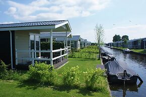 Lakeside Cottage With Boat