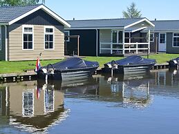 Lakeside Cottage With Boat