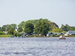 Lakeside Cottage With Boat