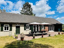 Spacious Farmhouse near Forest in Stramproy