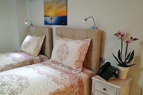 Elimia Suites & Studios