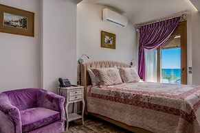 Elimia Suites & Studios