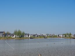 Cozy Chalet with Fireplace near Oosterschelde