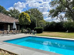Farmhouse in Sint Joost With Pool & BBQ