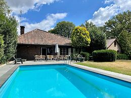 Farmhouse in Sint Joost With Pool & BBQ