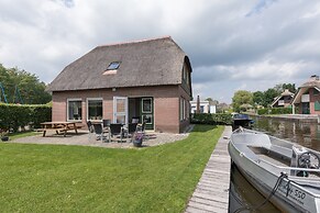 Rustic-chic Villa With Thatched Roof
