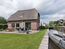 Rustic-chic Villa With Thatched Roof