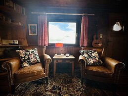 Cozy Forest Chalet Escape