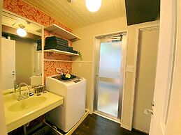 Chatan Tall House