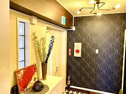 Chatan Tall House