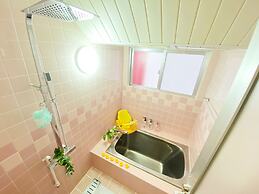 Chatan Tall House