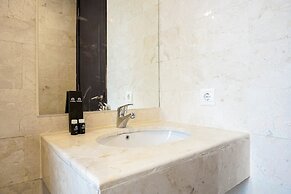 Comfortable Deluxe 2BR at The Empyreal Condominium Epicentrum Apartmen