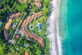 Spacious Open-Concept Condo with Stylish Design, Direct Beach Access &