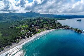 Spacious Open-Concept Condo with Stylish Design, Direct Beach Access &