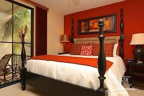 Luxe! Impressively designed 2nd-floor unit in Coco done in red and ora