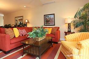Luxe! Impressively designed 2nd-floor unit in Coco done in red and ora