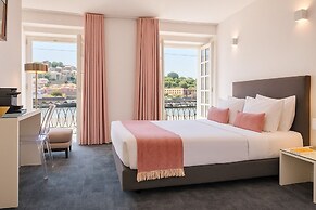 Miragaia Riverside Suites.