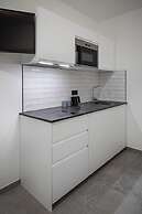 Home & Work Apartments