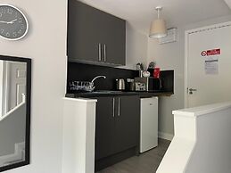 Grey Stone Studio Apartments